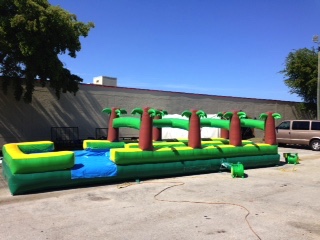 dual-jungle-slip-n-slide-bounce-house